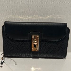 NWT Jolene Couture Black Pebble wallet with Creditcards, ID, and bill slots.